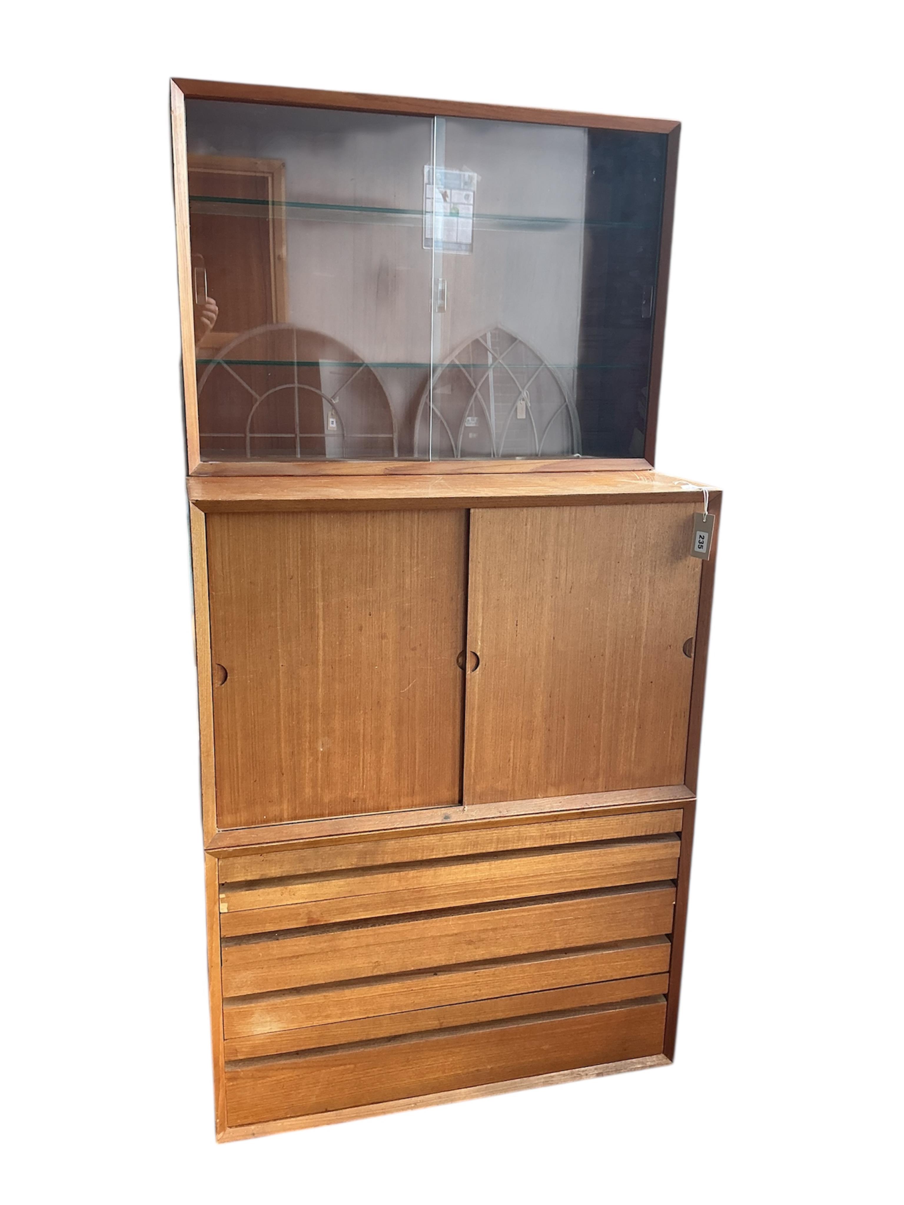 A Poul Cadovius Royal System teak three section wall system, width 80cm, depth 46cm, height 159cm